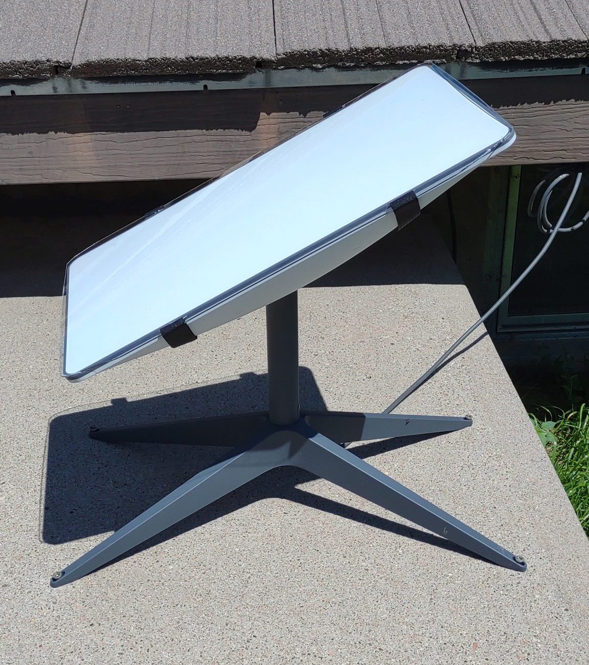 Side view of a satellite shield on a Starlink satellite.