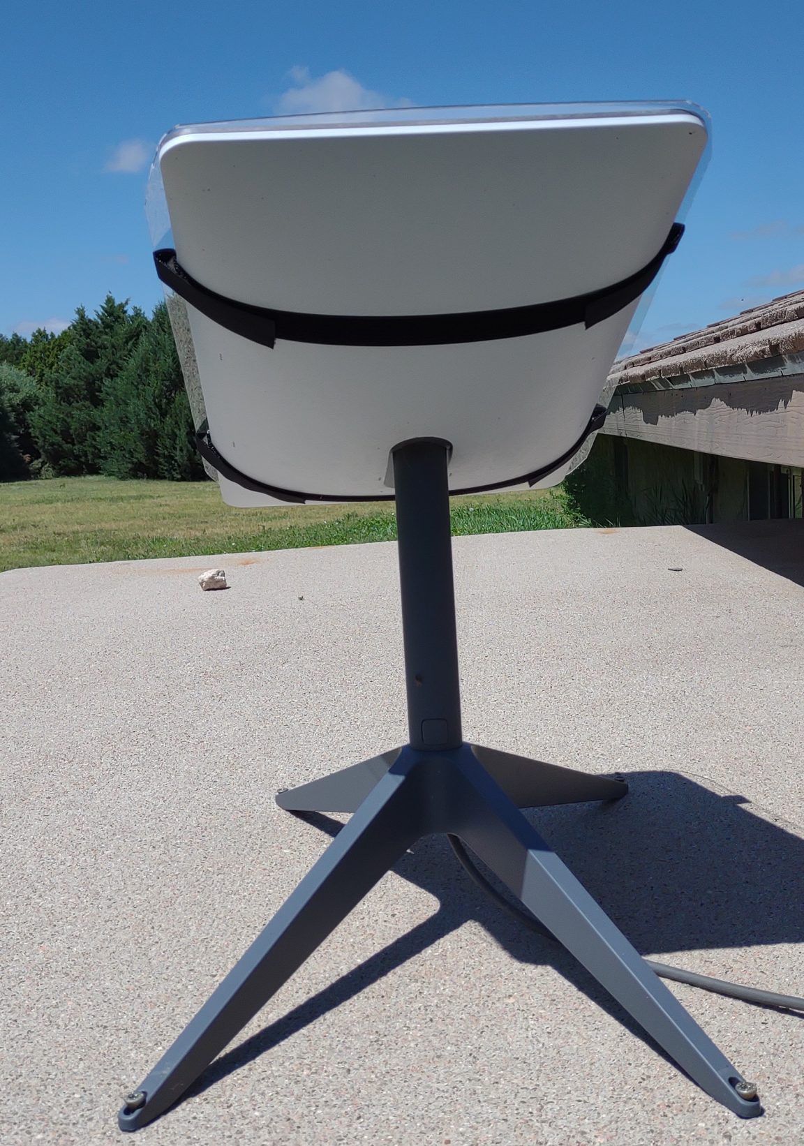 Back view of a Starlink Satellite with a satellite shield on it.